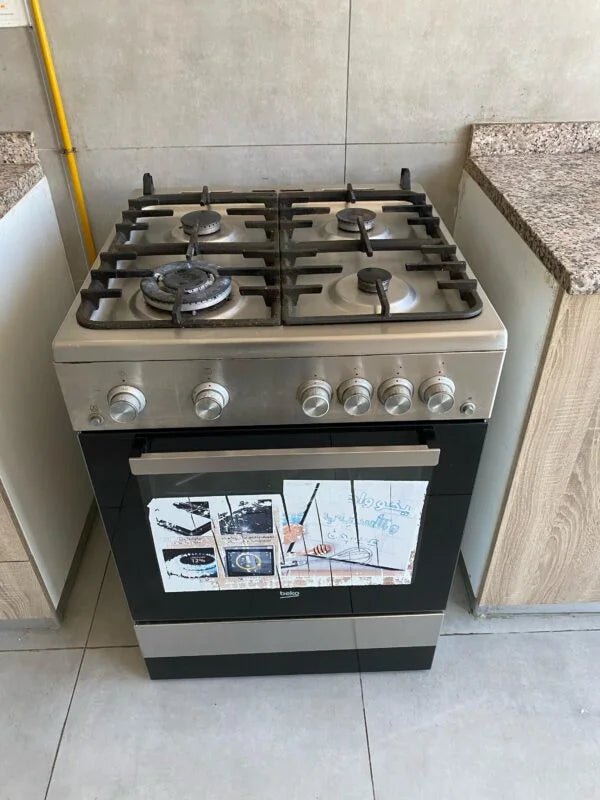 Beko 60cm Freestanding Gas Cooker | 4 Burner Hob | Gas Oven with Timer | Auto Ignition | Stainless Steel - althahanifurniture