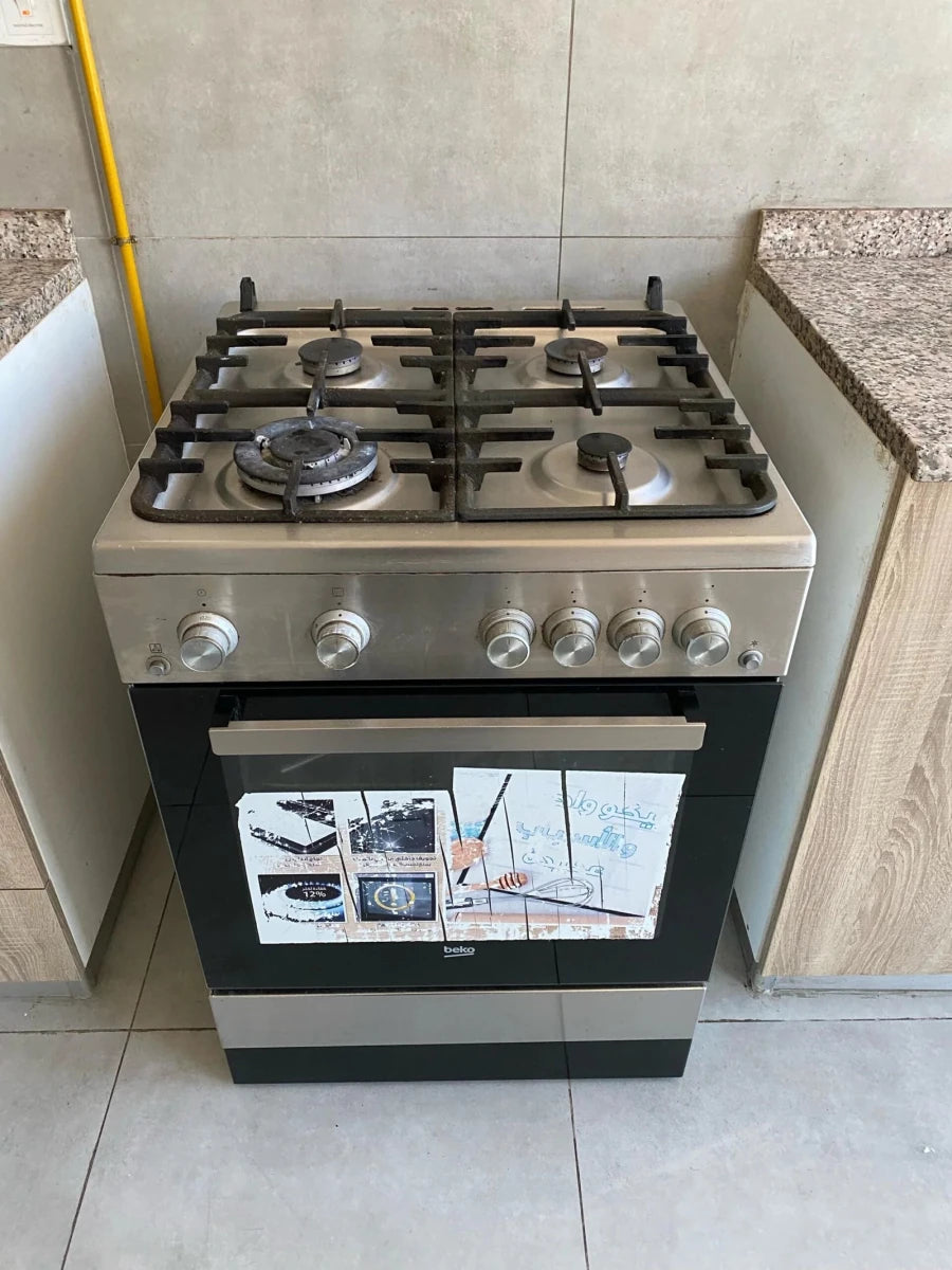 Beko 60cm Freestanding Gas Cooker | 4 Burner Hob | Gas Oven with Timer | Auto Ignition | Stainless Steel - althahanifurniture