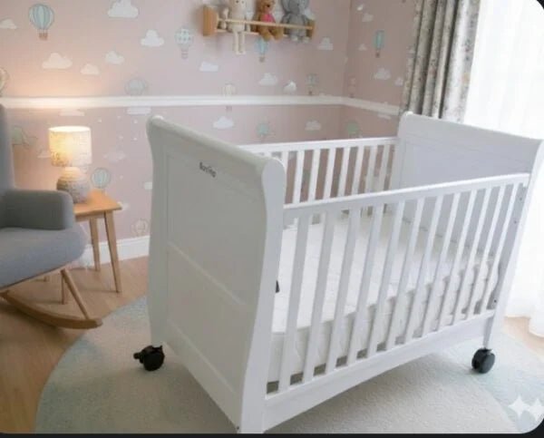 Bonfino Dream Luxe White Cot / Rocking Bed with Swivel Wheels - althahanifurniture