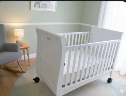 Bonfino Dream Luxe White Cot / Rocking Bed with Swivel Wheels - althahanifurniture