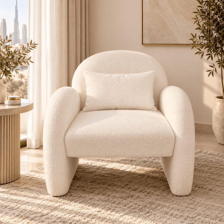 Fifty Five South Ozzero Ivory Bouclé Curved Armchair – 69 × 70 × 69 cm