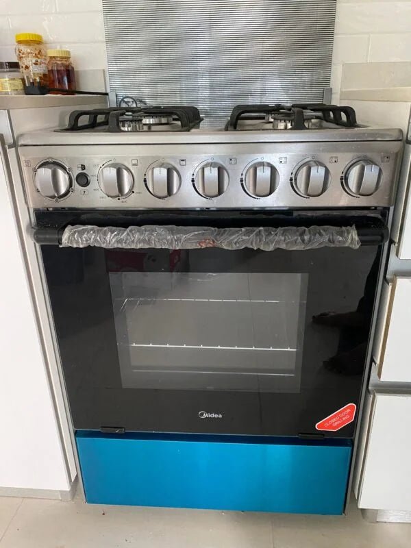 Midea 60cm Free Standing Gas Cooker | Stainless Steel | Closed Door Grilling | Frame Failure Protection - althahanifurniture