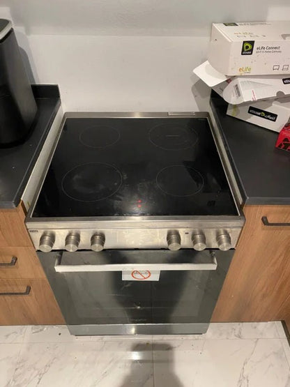 Whirlpool 60cm 4‑Burner Electric Cooker | Stainless Steel | Fan Oven & Closed‑Door Grill - althahanifurniture