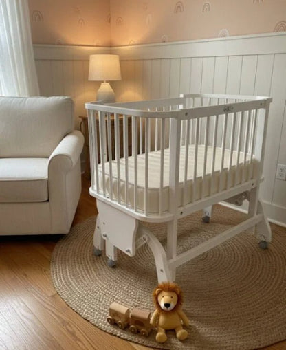 White Wooden Baby Gliding Crib | Modern & Soothing - althahanifurniture