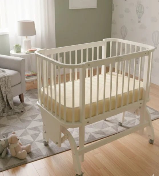 White Wooden Baby Gliding Crib | Modern & Soothing - althahanifurniture